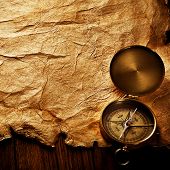 image of longitude  - Close up view of the compass on old paper - JPG 