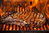 image of food  - A top sirloin steak flame broiled on a barbecue - JPG 