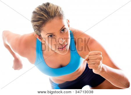 Picture or Photo of Competitive female athlete running - isolated over a white background