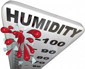 stock photo of pressure  - The rising humidity rate level rising on a thermometer past 100 percent to tell you of danger or uncomfortable weather conditions in the hot summer heat - JPG 