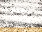 foto of floors  - Old brick wall on wood floor - JPG 
