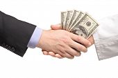 foto of handshake  - Businessman with money handshaking with doctor isolated on white background - JPG 