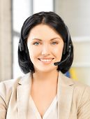 stock photo of helpline  - bright picture of friendly female helpline operator - JPG 
