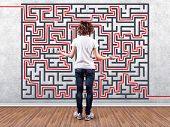 pic of  photo  - Photo of the girl before a wall with a labyrinth - JPG 