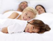 pic of family  - Young family resting together in parent - JPG 