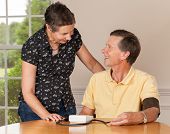 stock photo of pressure  - Senior caucasian retired male taking blood pressure at home - JPG 