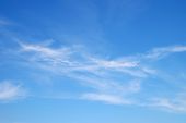 stock photo of sky  - Fantastic soft white clouds against blue sky - JPG 