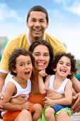 foto of outdoor  - happy family portrait outdoors during a holiday  - JPG 