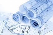 stock photo of construction  - rolls of architecture blueprints  - JPG 