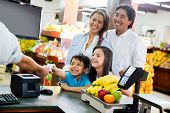 foto of finance  - Family looking out for home finances at the supermarket - JPG 
