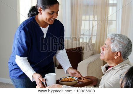 Picture or Photo of Home health care worker and an elderly couple