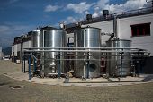 stock photo of industrial  - Industrial plant with pipes tubes and silos - JPG 