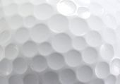 stock photo of golf  - Close up shot of a Golf Ball - JPG 