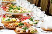 picture of restaurant  - catering table set service with silverware and glass stemware at restaurant before party - JPG 